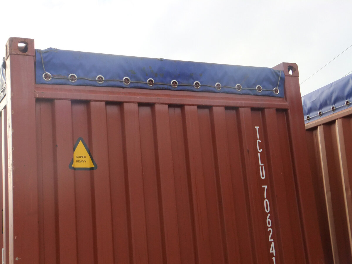 Close look at Tail-Wind's canvas cover on a container