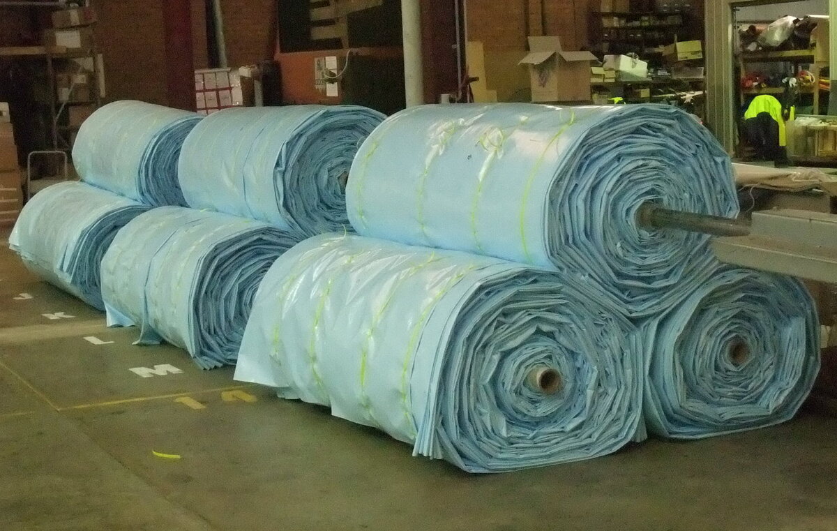 Grain bunker covers rolled onto cores at the Ellis and Sons Group factory in Cowra, NSW