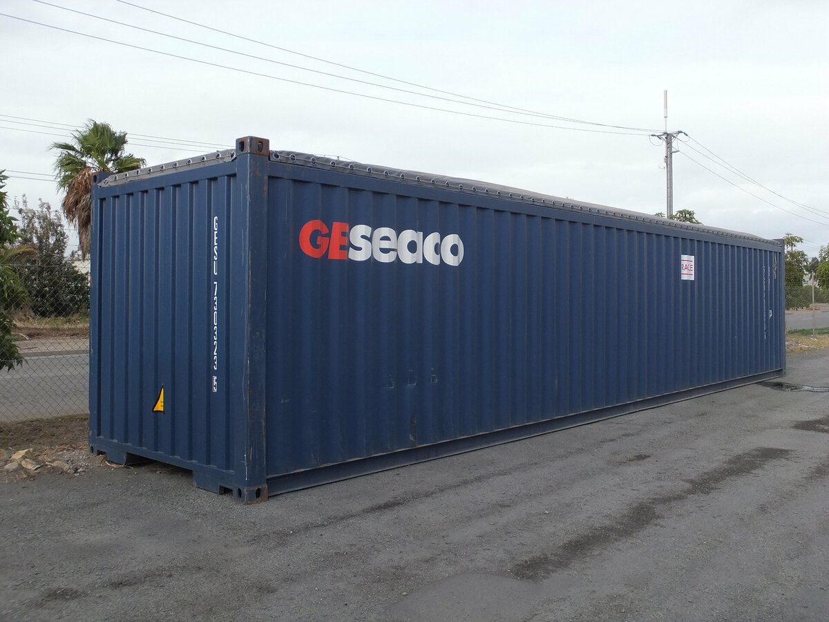 Blue container in a parking lot