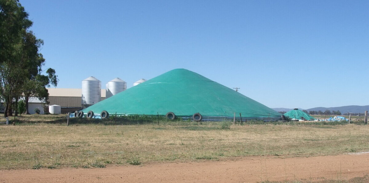 A Grain Ring Tarp Cover manufactured and supplied by Tail-Wind Tarps, Ellis & Sons Group