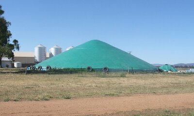 A Grain Ring Tarp Cover manufactured and supplied by Tail-Wind Tarps, Ellis & Sons Group