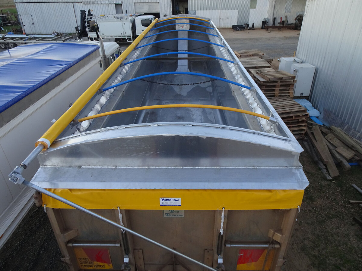 Top down view of a truck roll over tarp opened