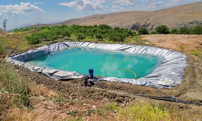 Small pond in a paddock lined with a dam liner.