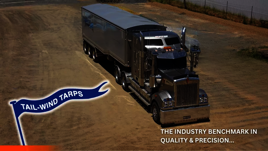 A truck with a roll-over tarp cover supplied and installed by Tail-Wind Tarps and Ellis and Sons Group