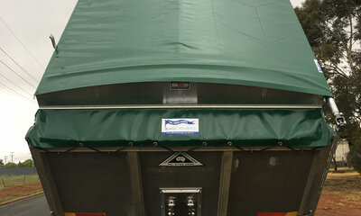 Tail-Wind truck roll top cover on a truck trailer